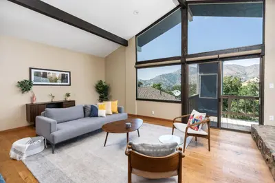 a living room with a couch and chairs and windows at Mountain View, Hot Tub, Open Kitchen, 10m to Sequoia in Three Rivers