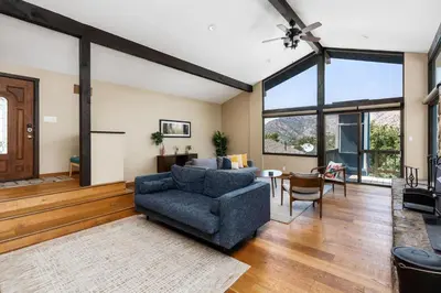 a living room with a couch and a table at Mountain View, Hot Tub, Open Kitchen, 10m to Sequoia in Three Rivers