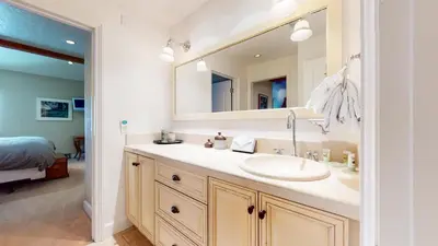 a bathroom with a sink and a mirror at Summit #92 condo in Mammoth Lakes