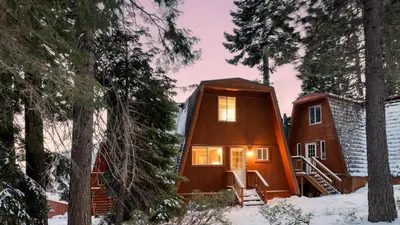 a cabin in the woods in the snow at Chickaree Chickadee Buyout by AvantStay 2 Sister Cabins in Tahoe City