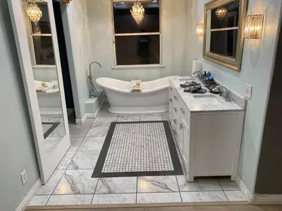 a white bathroom with a tub and a sink at Beautiful peaceful desirable home in Madera Rancho in Madera