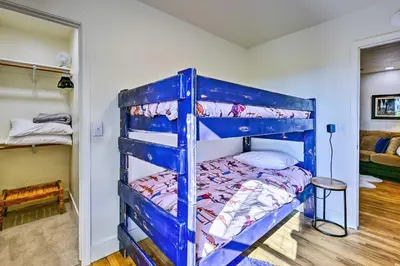 a blue bunk bed in a room at Peaceful Ranch Home with Sierra Nevada Views in Woodlake