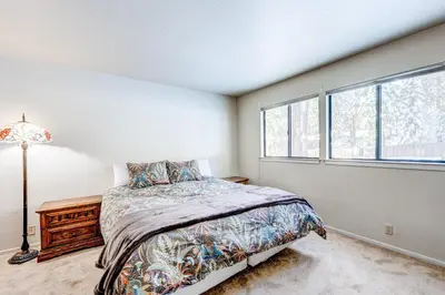 a bedroom with a bed and a window at Lakeview Serenity in Incline Village