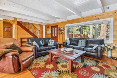 a living room with leather furniture and a table at Newly Renovated, Foosball Table in South Lake Tahoe