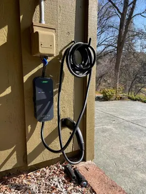 a hose hooked up to a wall with a meter at Yosemite Corner w NEW game room/Hot Tub/EV more in Oakhurst