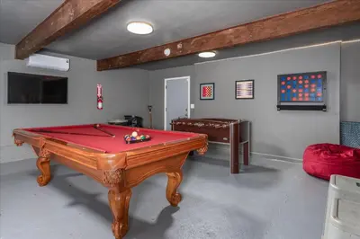 a room with a pool table in a room at Yosemite Corner w NEW game room/Hot Tub/EV more in Oakhurst