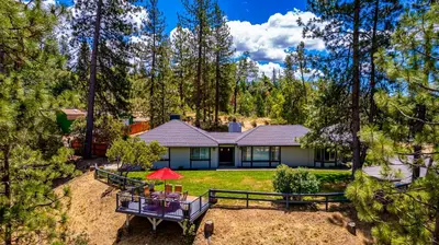 an aerial view of a house in the woods at Starry Pines- Pet friendly/spa/affordable in Oakhurst