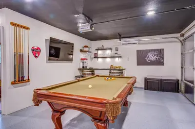 a billiard room with a pool table in it at Summit Cabin Stunning home Loaded with amenities in Oakhurst