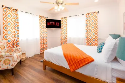 a bedroom with a bed and a ceiling fan at Canyon View House w/ hot tub, game room, views, and more in Oakhurst