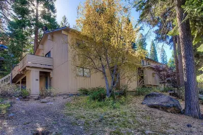 a house in the middle of a forest at Sugar PIne home in Incline Village