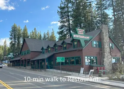 a wooden building on the side of a road at Foothill Folly home in Zephyr Cove