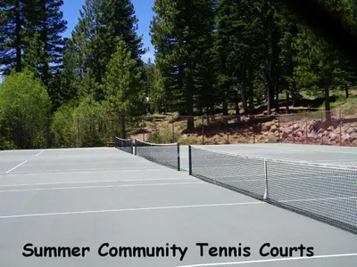 a tennis court with two tennis courts at Forest View Townhouse home in Kings Beach