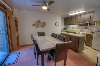 a kitchen with a table and chairs in a room at Sparrow's Nest home in Incline Village