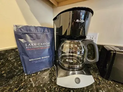 a blender sitting on a counter next to a bag at Tall Pines Retreat condo in Incline Village