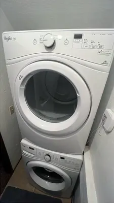 a white washing machine sitting in a room at Lakescape condo in Stateline