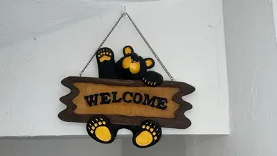 a welcome sign with a moustache and glasses at Lakescape condo in Stateline