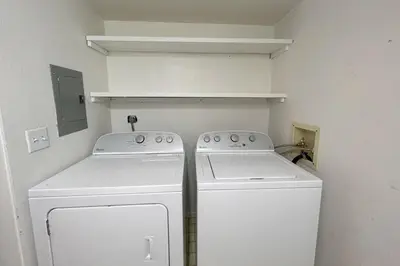 a white washer and dryer in a small kitchen at Tumbleweed Pines home in Incline Village
