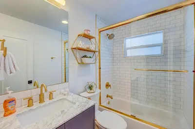 a bathroom with a sink and a toilet and a shower at The Home at the End of the Rainbow in South Lake Tahoe