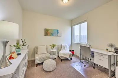 an office with a desk and chairs in a room at Visalia Home with Yard 4 Mi to Downtown! in Visalia