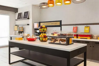 a kitchen with a counter with food on it at Hampton Inn Stockton, Ca in Stockton