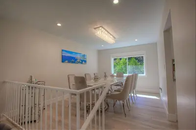 a dining room with a table and chairs at Creek Side Summit home in Stateline