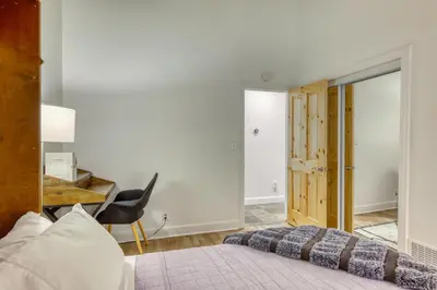 a bedroom with a bed and a desk and a chair at Inviting Tahoe Escape in Incline Village