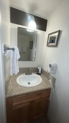 a bathroom with a sink and a mirror at Bear Lake Hideaway condo in South Lake Tahoe