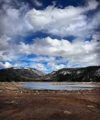 a large body of water with mountains in the background at Cabin #2 in Strawberry