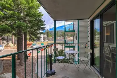a balcony with a table and chairs on it at Heavenly Mountain Lake Retreat Near Skiing, Hiking & Biking in Stateline