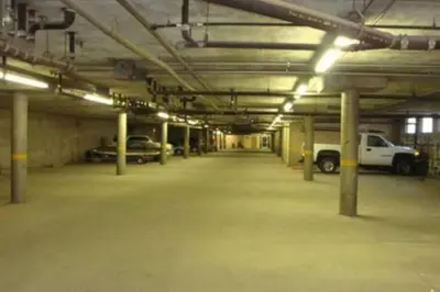an empty parking garage with cars parked in it at Heavenly Lakeside Retreat Close to downtown in South Lake Tahoe