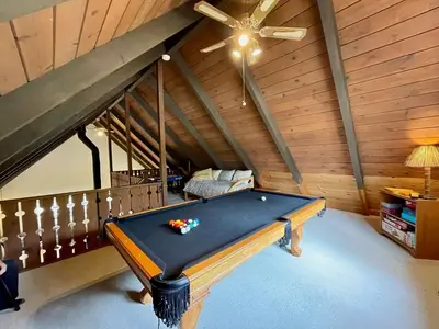 a pool table in a room with a ceiling at Blue Lake Chalet- 3 Bedroom + Loft/Pool Table in Arnold/Bear Valley (Pet-Friendly) in Arnold