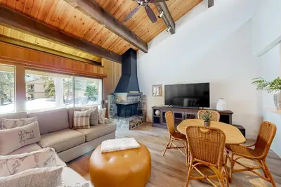 a living room with a couch and a table at Kingswood Village 60 in Kings Beach