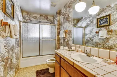 a bathroom with a sink and a toilet at Pet Friendly - Close To Heavenly, Steps To The River in South Lake Tahoe