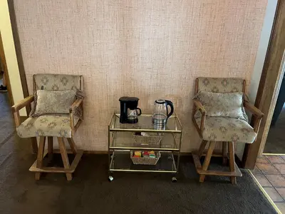 two chairs and a glass table with a tea pot on it at Pet Friendly - Close To Heavenly, Steps To The River in South Lake Tahoe