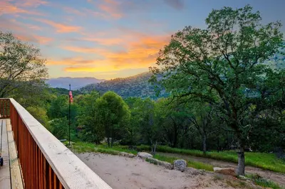 a wooden bridge with a view of a mountain at Casita 3 Rios Secluded Mountain Top Home Minutes to Sequoias & Kings Canyon in Three Rivers