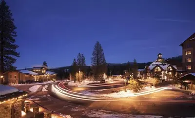 a city street at night with cars at Luxury Northstar Home| hot tub| walk to ski lifts in Truckee