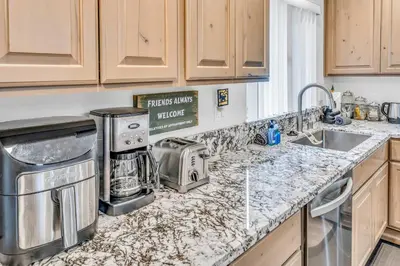 a kitchen with a sink and a counter top at Modern 3BD -Walk to Lake & Beach in Tahoe City