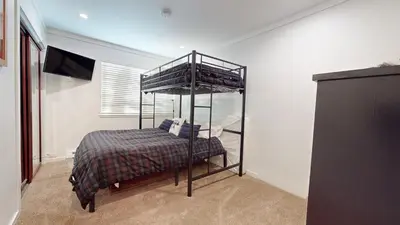 a bedroom with a bunk bed in a room at Mammoth Estates #225 condo in Mammoth Lakes