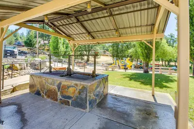 a large stone slab under a pavilion at a park at Big Creek Hideaway in Groveland