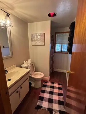 a bathroom with a toilet and a sink at Summer Escape Chalet with Pool Access in BLS in Arnold
