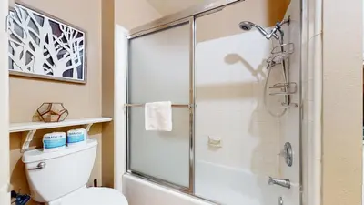 a bathroom with a shower and a toilet at Aspen Creek #227 condo in Mammoth Lakes